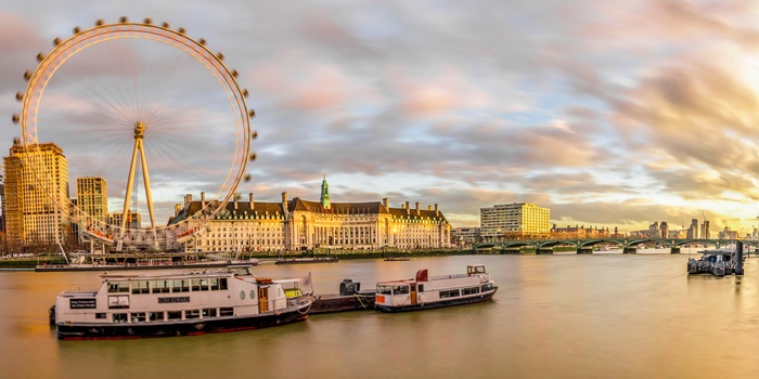 London Eye og Themsen i aftensol, England