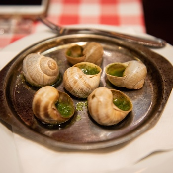 Escargot på Le Dome Cafe i Paris