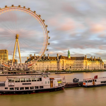 London Eye og Themsen i aftensol, England