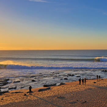 Stranden ved Jeffreys Bay i Sydafrika