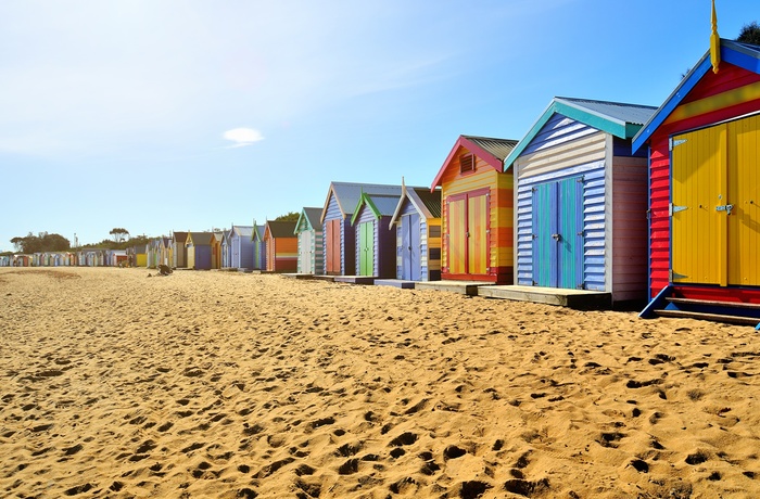 Brighton Beach med de farverige badehuse nær Melbourne - Australien