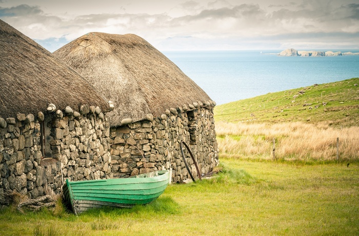 Skotland, Isle of Skye - traditionelle stenhuse på Skye Museum of Island Life