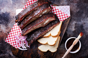 Barbeque smoked beef brisket with BBQ sauce