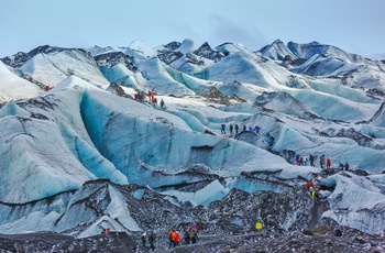 Turister på vej op ad Solheimajokul gletsjer, Island