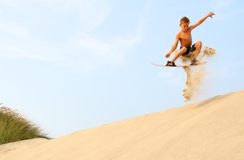 Sandboarding i Oregon Dunes sandklitter