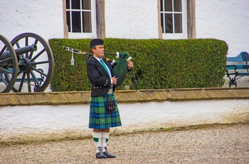 Skotte i klanens kilt på slottet Blair Castle, Perthshire i Skotland