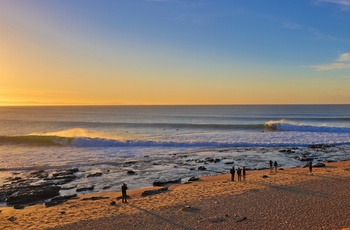 Stranden ved Jeffreys Bay i Sydafrika