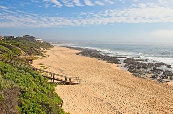 Stranden ved Jeffreys Bay i Sydafrika