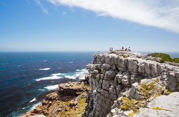 Turister på klippe med udsigt til Kap det gode håb, Sydafrika